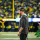 Oregon Ducks head coach Dan Lanning on the sideline against the Washington Huskies.
